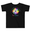 In a world where you can be anything, be kind Toddler Short Sleeve Tee